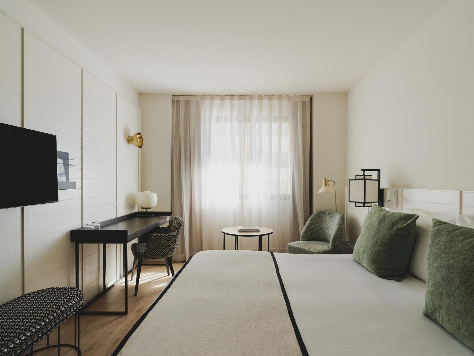 Habitación urbana con cama supletoria